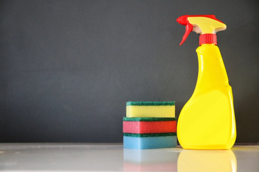 Household chemicals — cleaning spray and sponges